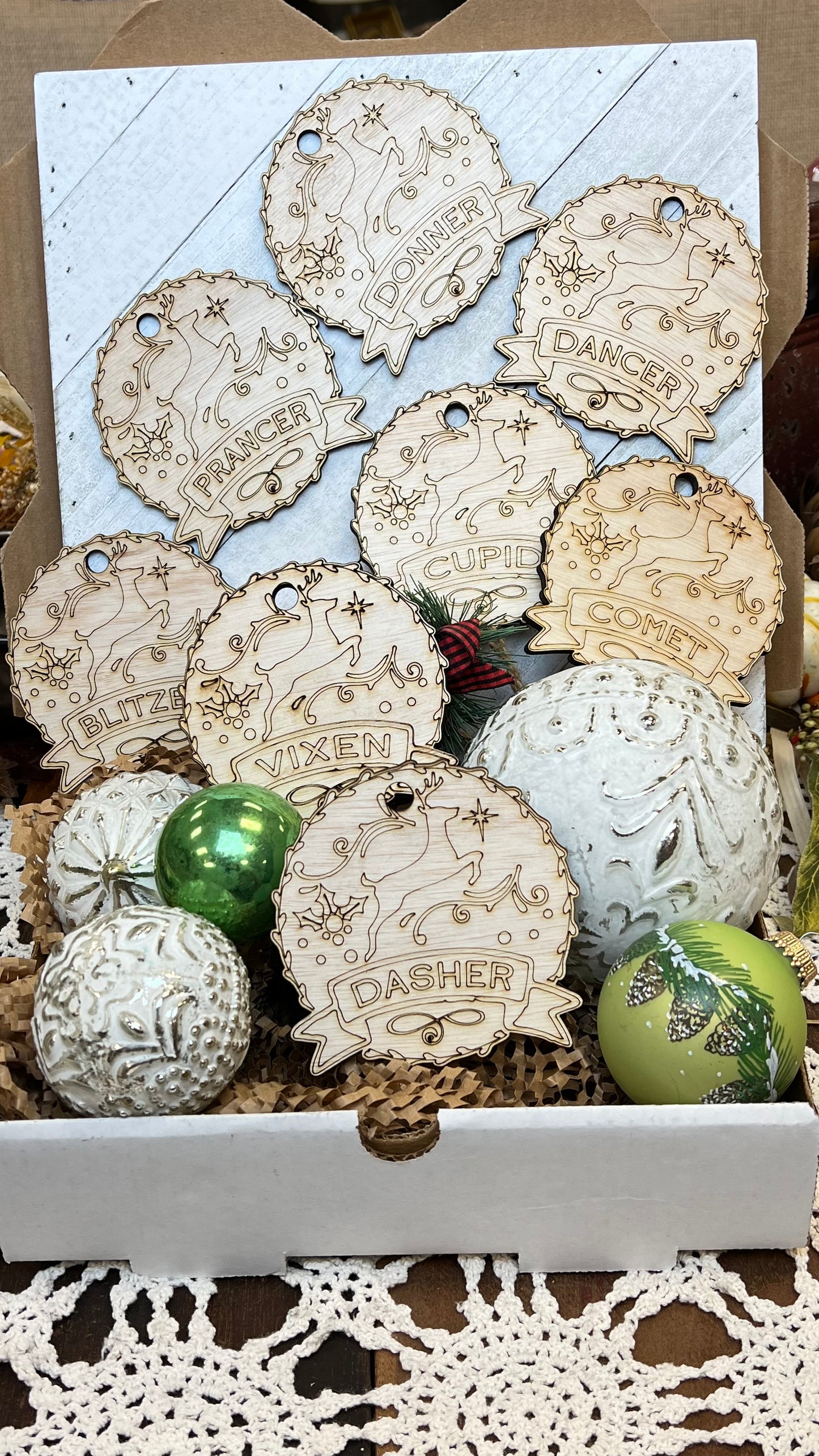 Santa's Reindeer ornaments. Custom made 1/4-inch plywood laser cut ornaments. Comet, Cupid, Donner, Blitzen, Dasher, Dancer, Prancer, and Vixen