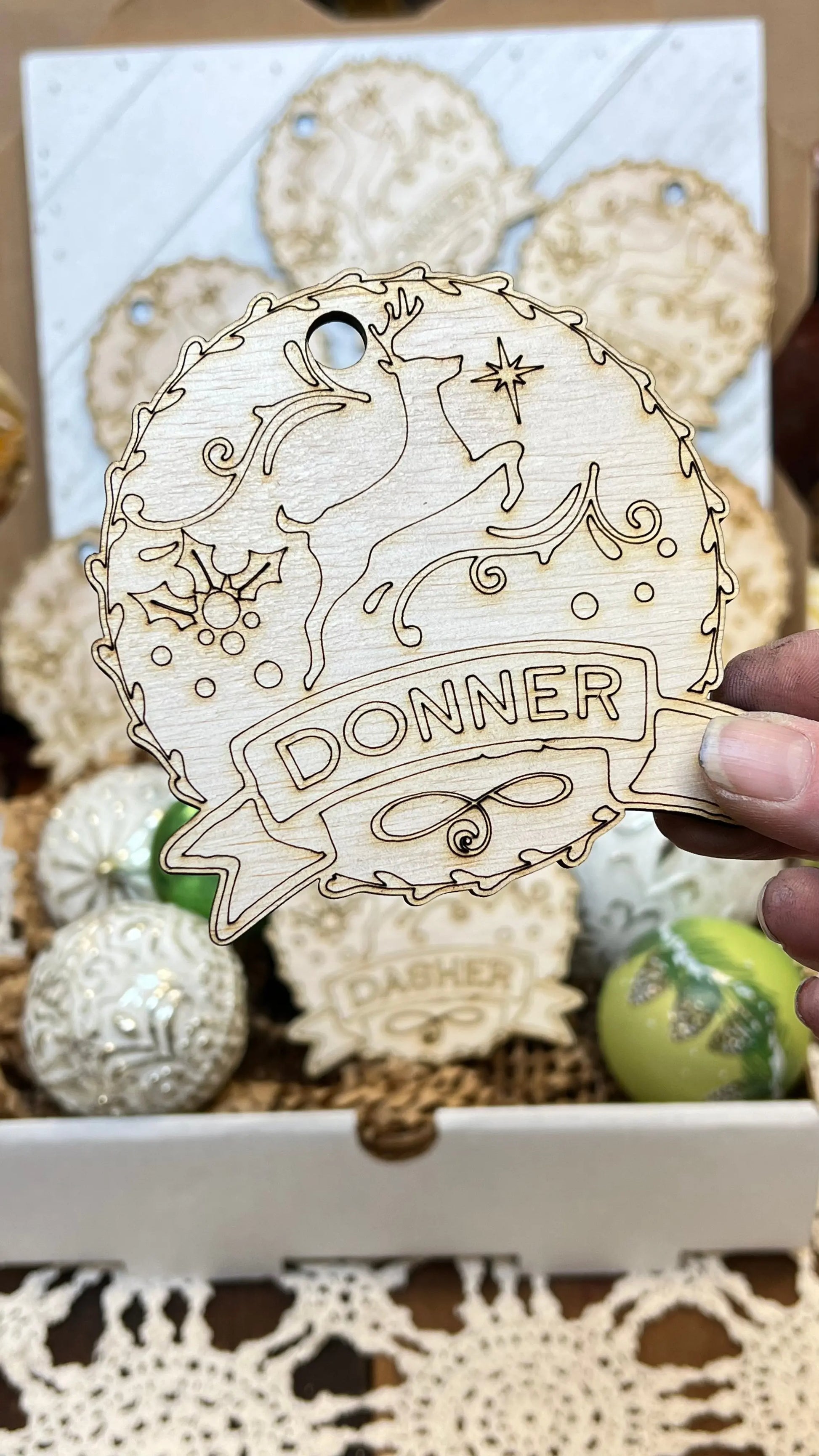 Santa's Reindeer ornaments. Custom made 1/4-inch plywood laser cut ornaments. Comet, Cupid, Donner, Blitzen, Dasher, Dancer, Prancer, and Vixen Sisters by Choice