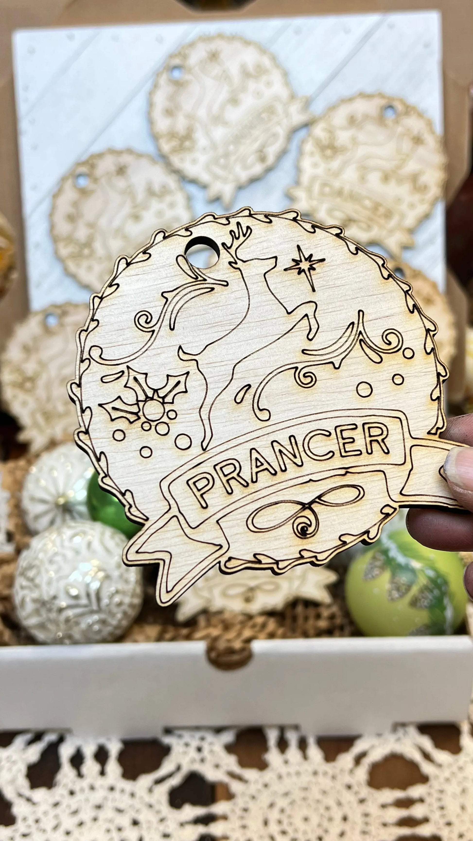 Santa's Reindeer ornaments. Custom made 1/4-inch plywood laser cut ornaments. Comet, Cupid, Donner, Blitzen, Dasher, Dancer, Prancer, and Vixen Sisters by Choice