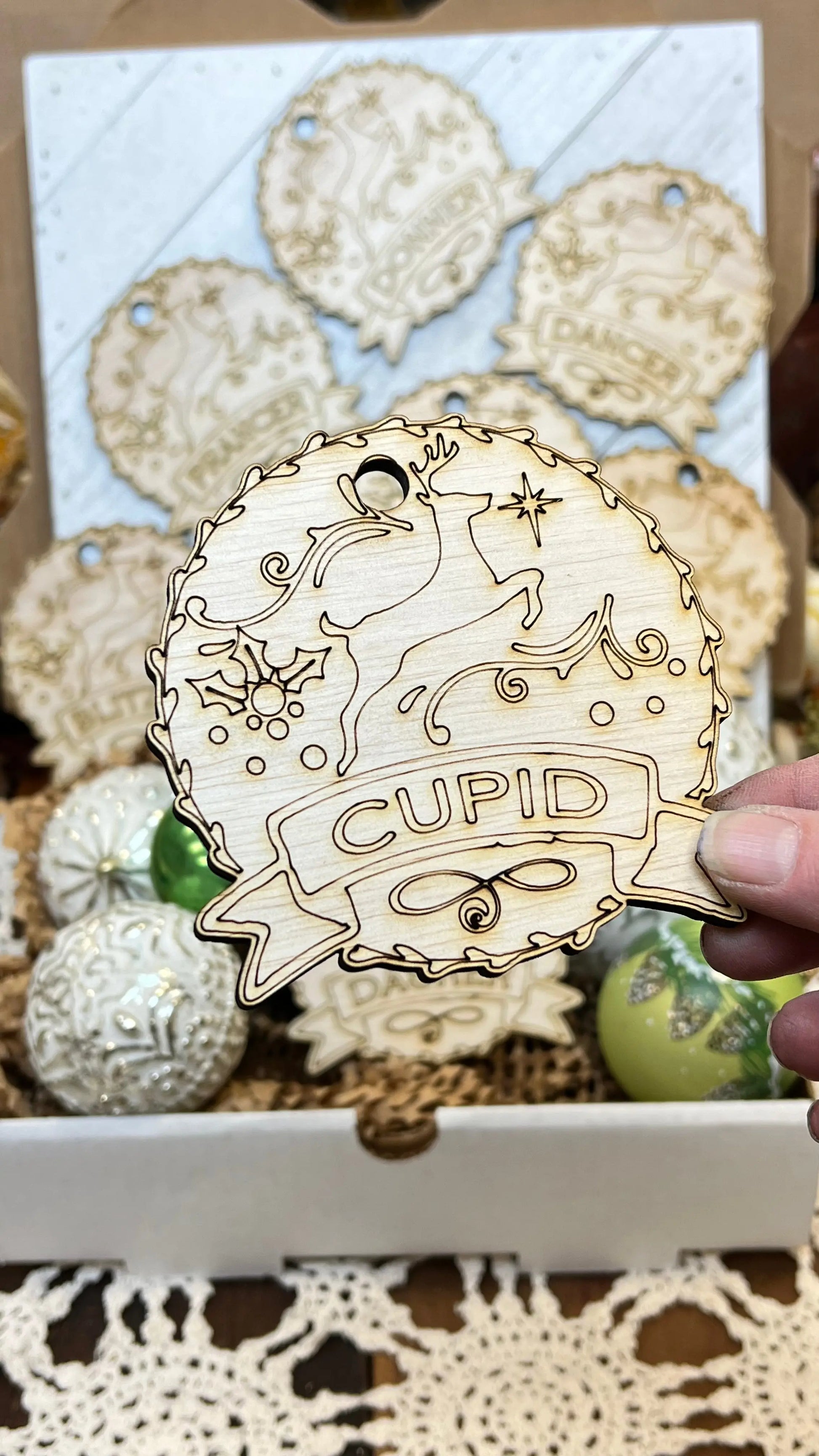 Santa's Reindeer ornaments. Custom made 1/4-inch plywood laser cut ornaments. Comet, Cupid, Donner, Blitzen, Dasher, Dancer, Prancer, and Vixen Sisters by Choice