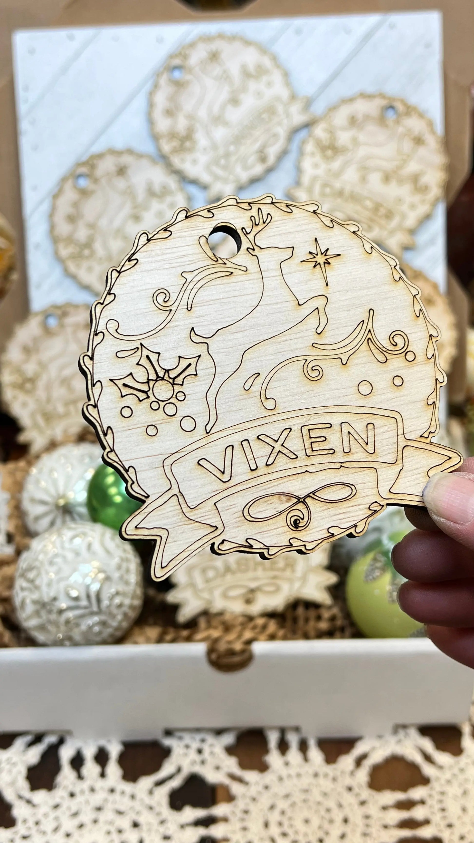 Santa's Reindeer ornaments. Custom made 1/4-inch plywood laser cut ornaments. Comet, Cupid, Donner, Blitzen, Dasher, Dancer, Prancer, and Vixen Sisters by Choice